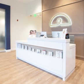 The reception area of an Ideal Image clinic.