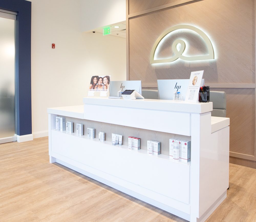 The reception area of an Ideal Image clinic.