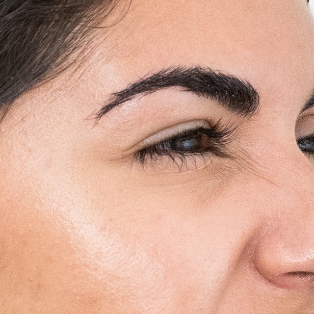 Closeup of a side angle of a woman's eye region.