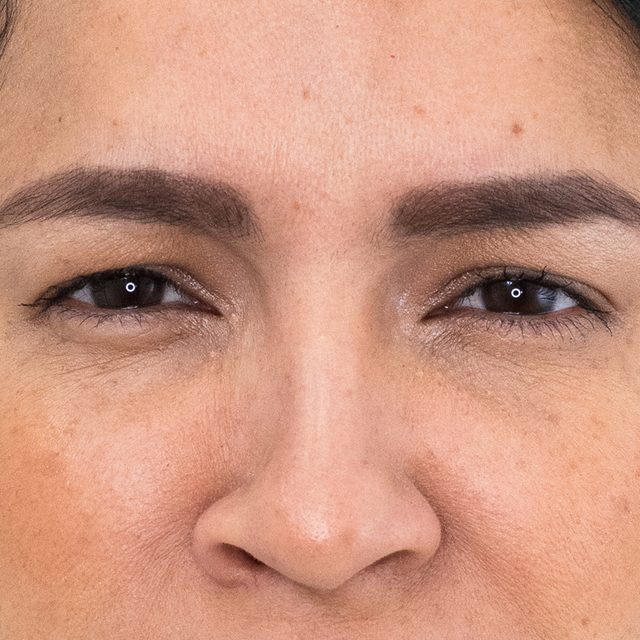 Closeup of a woman's face, focusing on her eyes.