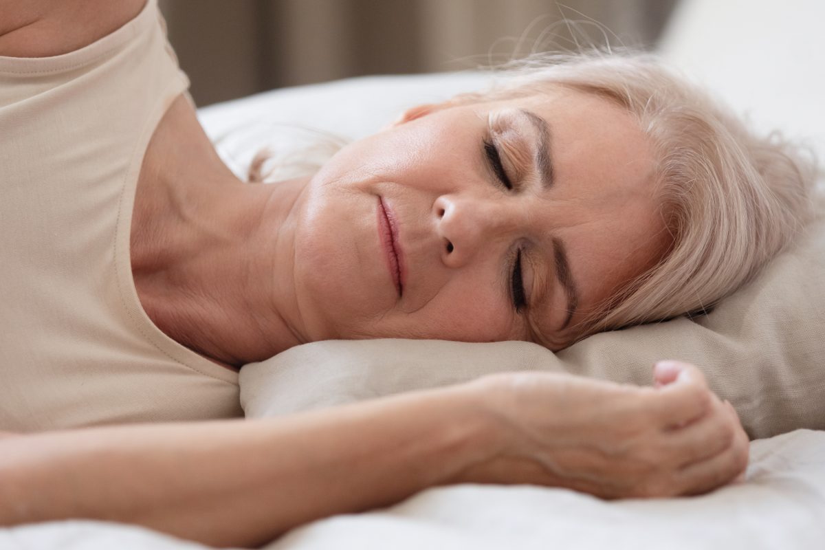 woman laying down with eyes closed