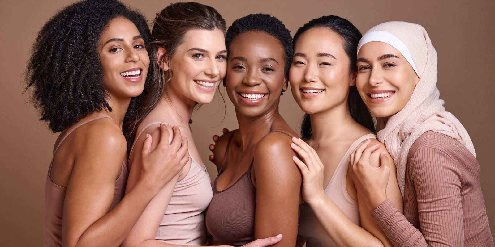 five woman smiling