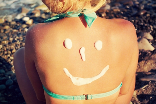 smiley face on back in lotion