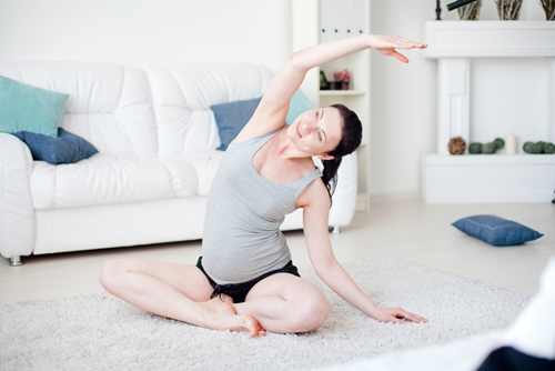 woman stretching - doing yoga