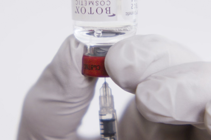 Syringe in Botox vial